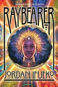 A head shot of a young woman is shown in the center of the cover wearing a head covering that is gold and her hair spread out behind her. She dots of white paint lining her cheeks and forhead and a thick gold necklace. The rest of the cover shows various cylinders displayed in rays around the image. The title and authors name are at the top and bottom of the cover.
